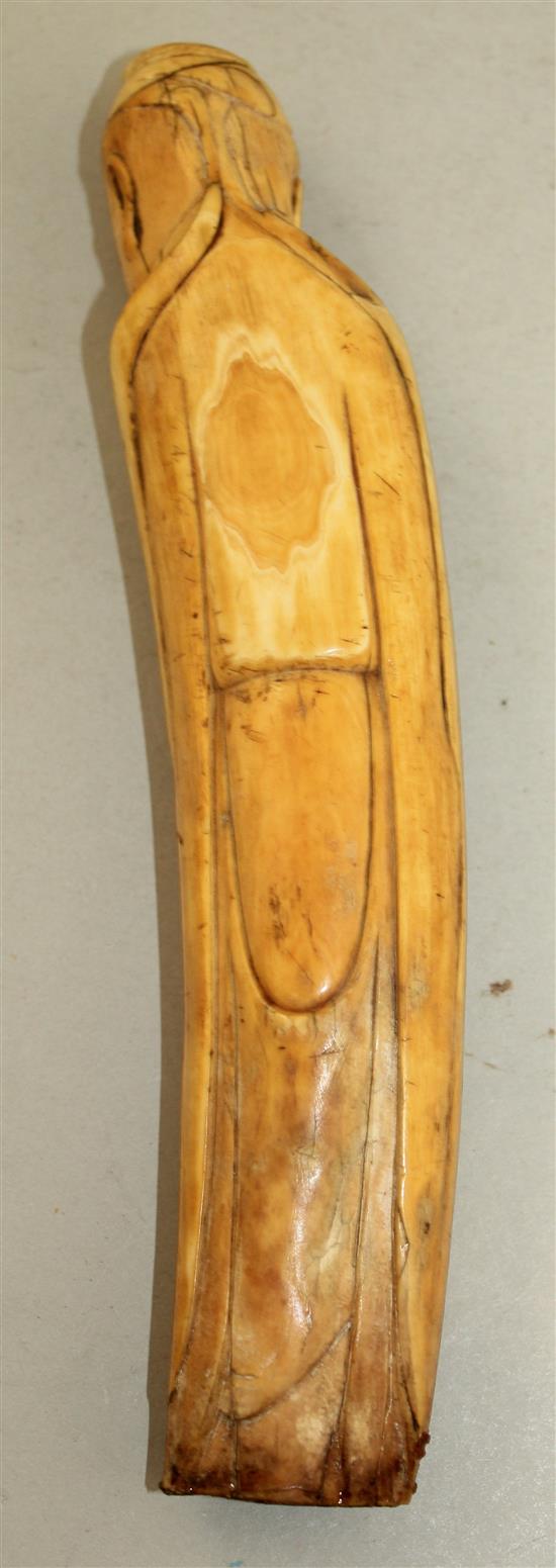 A Chinese ivory figure of a sage, late Ming dynasty, 20cm, age cracks, with stand